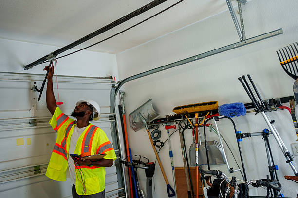 Professional Garage Door Installation technician working in West Lafayette, IN